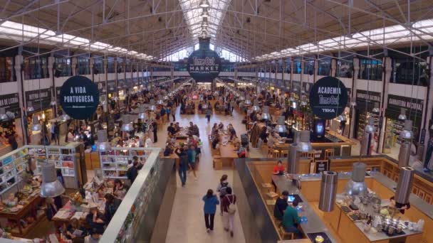 Time out Market hall in Lisbon also called Mercado do Ribeira - CITY OF LISBON, PORTUGAL - NOVEMBER 5, 2019 — 비디오