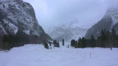 Wonderful snowy winter landscape in the Alps - aerial view 