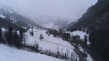 Drone flight over a snowy winter landscape on a winter s day