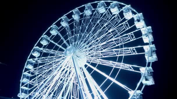 Carousels at amusement fair at night - CARDIFF, WALES - DECEMBER 31, 2019 — 图库视频影像