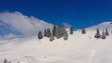 The Swiss Alps in winter - flight over wonderful snow mountains - aerial photography