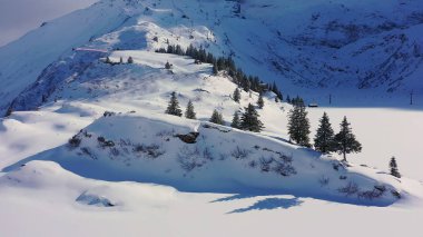 Snow covered mountains - a winter s day in the Alps - aerial view - aerial photography
