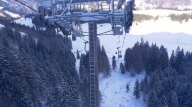 Ride in a cable car in the Alps on a winters day - ENGELBERG, SWITZERLAND - FEBRUARY 5. 2020