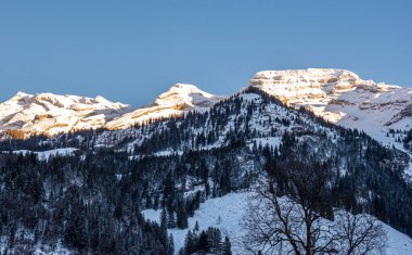 Wonderful snowy winter landscape in the Alps - aerial view
