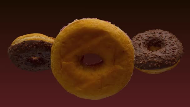 Donut - close-up van een selectie van donuts stop trick shot — Stockvideo