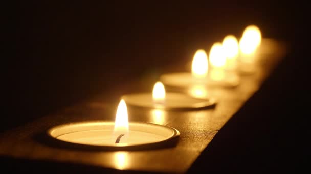 Candele in fila - bel tiro macro — Video Stock