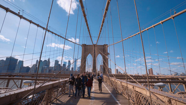 The famous Brooklyn Bridge in New York - NEW YORK CITY, UNITED STATES - APRIL 2, 2017
