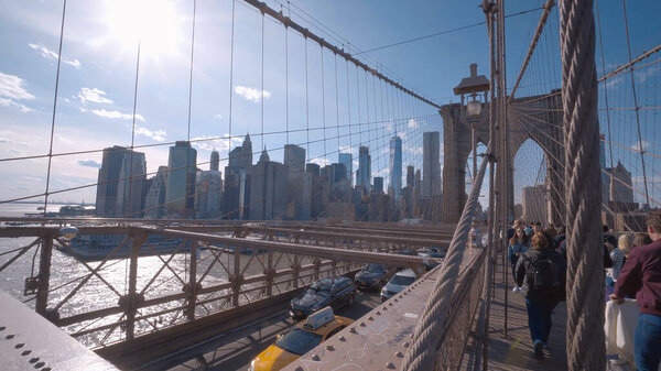 Wonderful Brooklyn Bridge - an important landmark of New York - NEW YORK CITY, UNITED STATES - APRIL 2, 2017