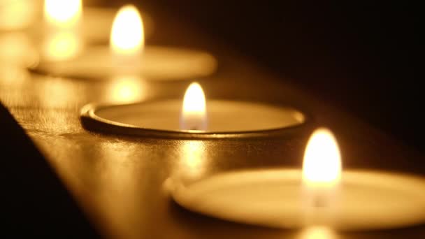 Candles in a row - beautiful macro shot — Stock Video