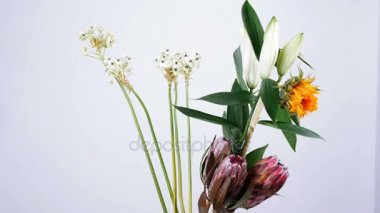 yakın çekim, egzotik çiçek, buket, beyaz arka plan üzerinde döndürme,