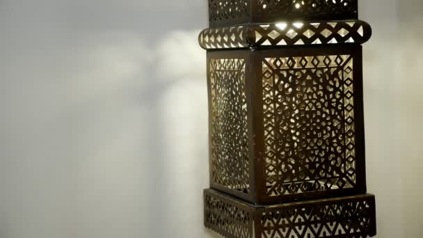 Open-work, brown, metalic lamp, decorated in Arabic style, close-up. Concept for Moroccan and Arabian culture and design. — Stock Video