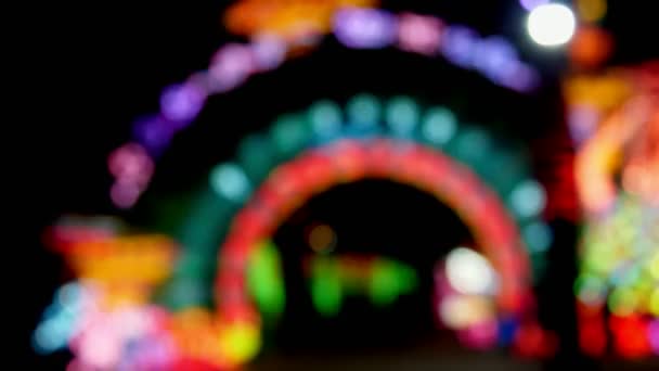 Beautiful background of multicolored illumination. close-up, blurred, soft focus. Defocused abstract bokeh lights , Multicolor illuminated background — Stock Video