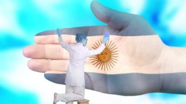 Tıbbi maskeli ve eldivenli hemşire, Arjantin bayrağı renginde boyanmış büyük elleri yıkıyor. Ulusal sağlık hizmetleri. Ellerinizi yıkayın. Virüs koruması. Hastalıkların önlenmesi.