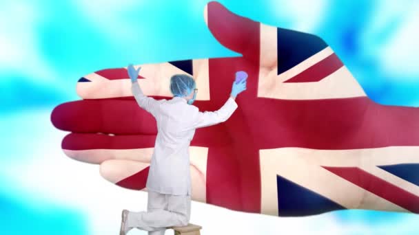 Nurse in medical mask and gloves washes large hand, painted in colors of United Kingdom flag. State care for nation health. Wash your hands concept. Viruses protection. Diseases prevention. — Stock Video