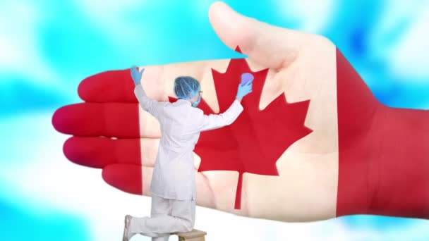 医療用マスクと手袋の看護師は、カナダの国旗の色で描かれた大きな手を洗う。国民の健康のための状態のケア。手の概念を洗ってください。ウイルス保護だ。病気の予防. — ストック動画