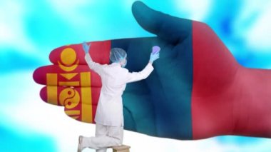 Tıbbi maskeli ve eldivenli hemşire, Moğolistan bayrağına boyanmış büyük elleri yıkıyor. Ulusal sağlık hizmetleri. Ellerinizi yıkayın. Virüs koruması. Hastalıkların önlenmesi.