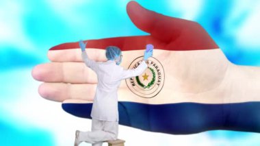 Tıbbi maskeli ve eldivenli hemşire, Paraguay bayrağı renginde boyanmış büyük elleri yıkıyor. Ulusal sağlık hizmetleri. Ellerinizi yıkayın. Virüs koruması. Hastalıkların önlenmesi.