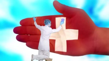 Tıbbi maskeli ve eldivenli hemşire, İsviçre bayrağı renginde boyanmış büyük elleri yıkıyor. Ulusal sağlık hizmetleri. Ellerinizi yıkayın. Virüs koruması. Hastalıkların önlenmesi.