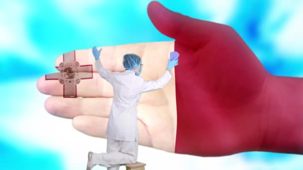 Nurse in medical mask and gloves washes large hand, painted in colors of Malta flag. State care for nation health. Wash your hands concept. Viruses protection. Diseases prevention. — Stock Video