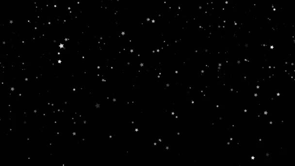 Abstracte feestelijke magische achtergrond. Twinkelende, glitterwitte deeltjes in stervorm die op zwarte achtergrond vallen. Vliegende, flikkerende sterren schitteren . — Stockvideo