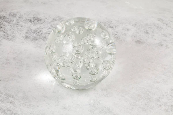 Boule de verre sur fond texturé — Photo