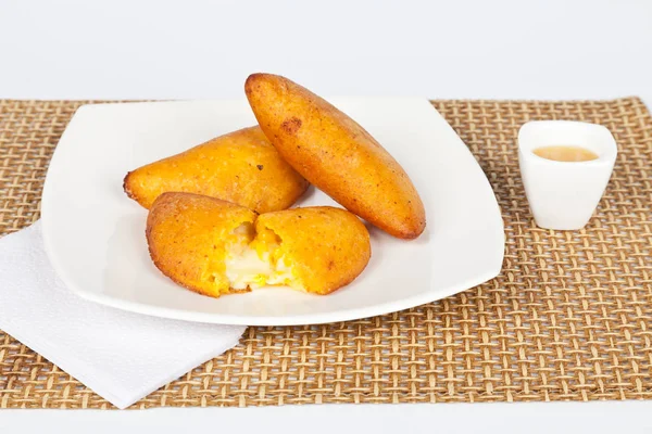 Tasty empanadas stuffed with cheese and tender corn — Stock Photo, Image