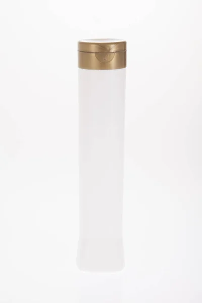 Білий Багатоцільовий Пластиковий Контейнер Золотою Кришкою — стокове фото