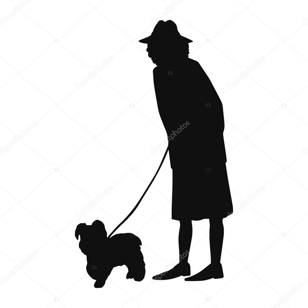Old woman walking with dog