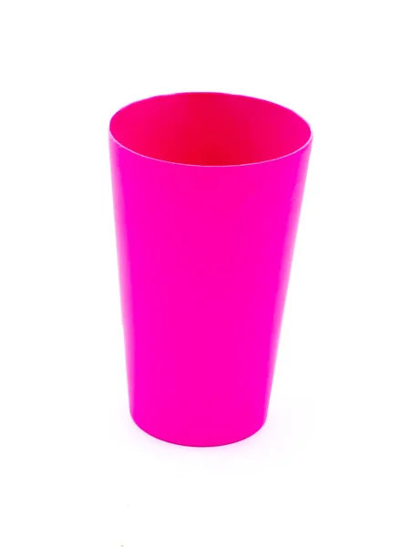 Copo de plástico rosa em um fundo branco — Fotografia de Stock