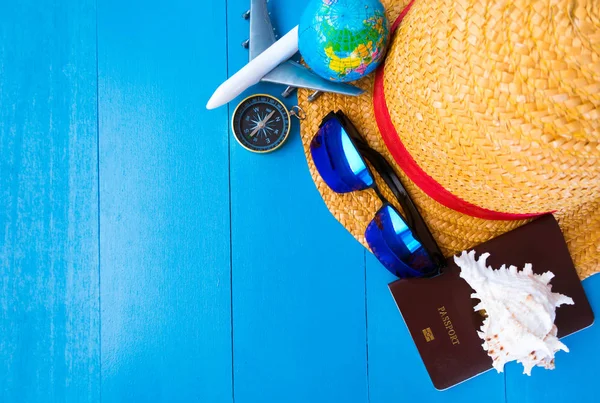 Travel kit on a blue background with free copy space, Summer and
