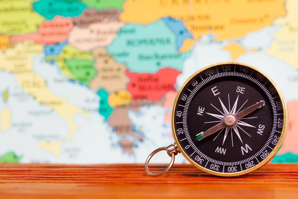 Compass on the map and travel ideas.