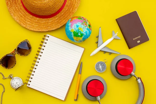 Summer Travel accessories and objects on Yellow background copy