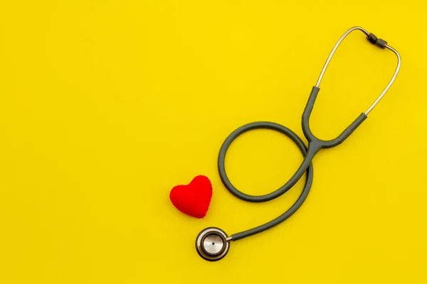 Above shot of a stethoscope puts on the left side of a table on ストックフォト