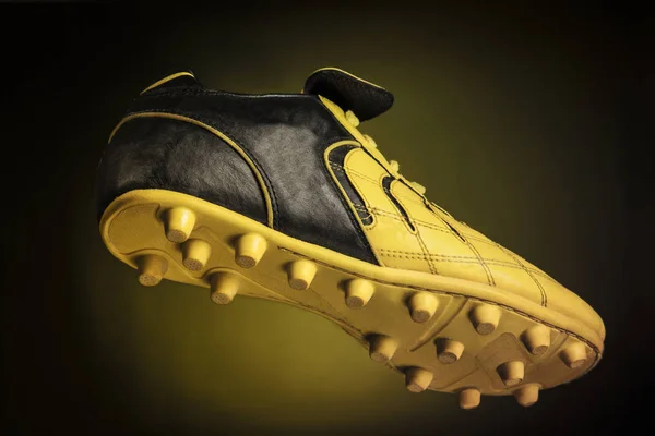 Black - yellow soccer shoe — Stock Photo, Image
