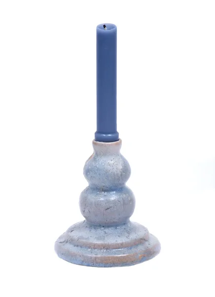 蓝色粘土陶瓷持有人和蓝色蜡烛 — 图库照片