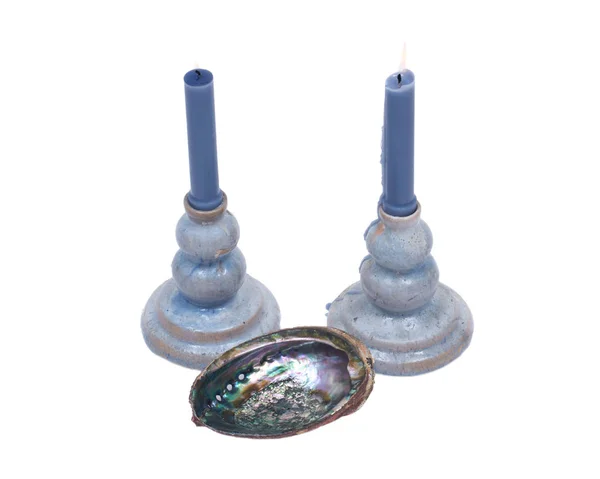 Blue clay ceramic candle holder and blue candle — Stock Photo, Image