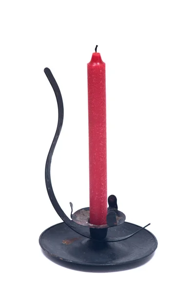 Piros gyertya fekete vintage gyertyatartó — Stock Fotó