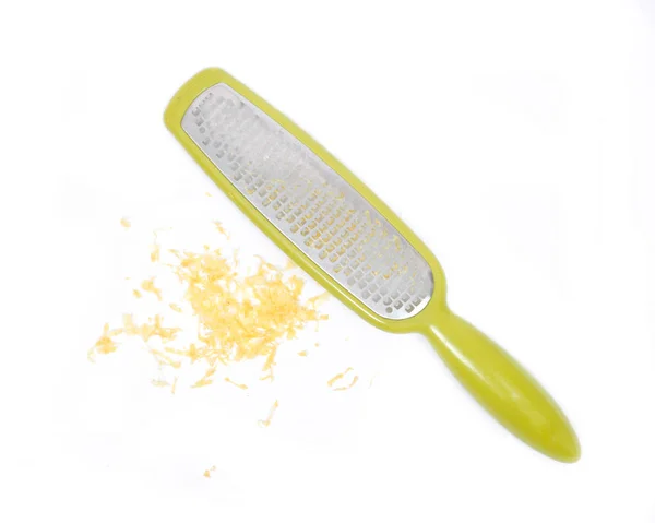 Stainless steel grate zester and lemon peel, zest — Stock Photo, Image