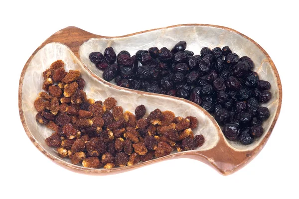 Dried golden berries and whole dried cranberries