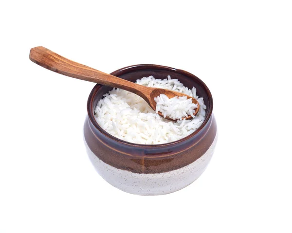 Cuillère en bois dans un bol en céramique avec riz — Photo