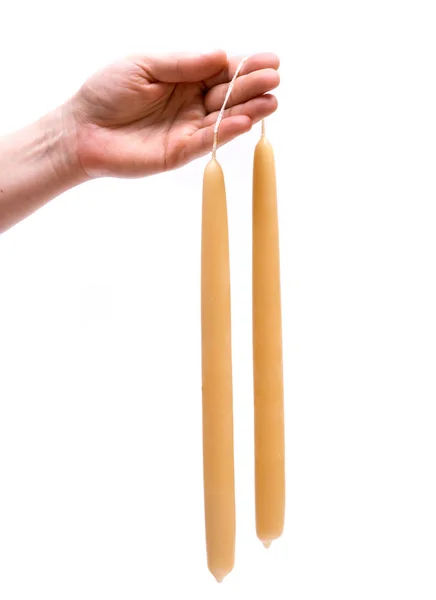 Daldırma el balmumu tapers, beyaz arka plan üzerinde izole mumlar