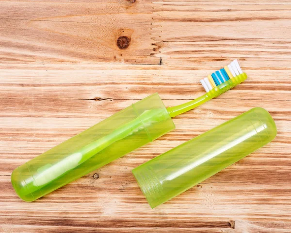 Πολύχρωμο Πλαστικό Οδοντόβουρτσα Ξύλινα Εκλεκτής Ποιότητας Φόντο — Φωτογραφία Αρχείου