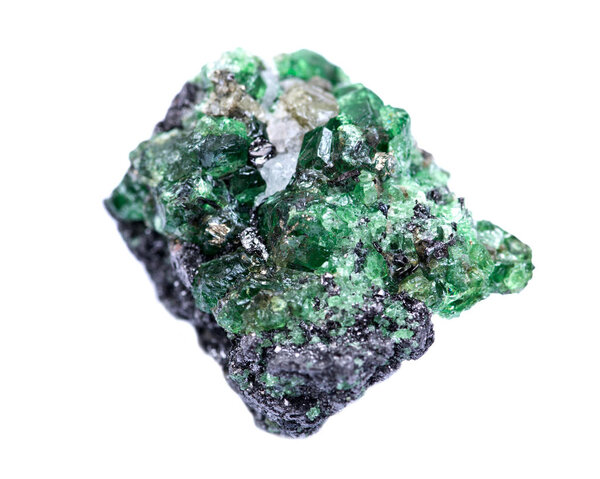 Partially crystallized rough Tsavorite from Tanzania isolated on white background