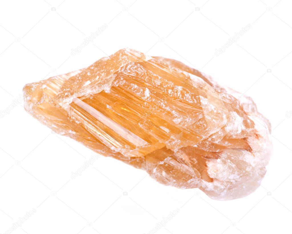 Partially crystallized golden Scapolite from Nigeria isolated on white background 