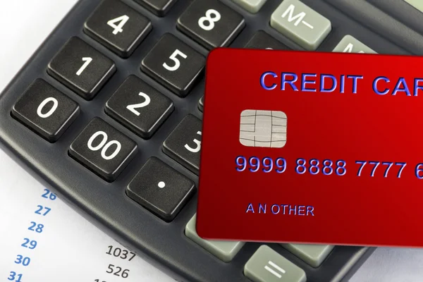 Röd kreditkort handpåläggning kalkylator knappsats — Stockfoto