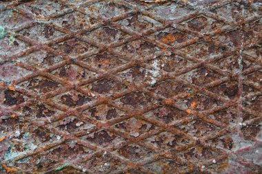 Rhombus şekillerle paslı metal doku