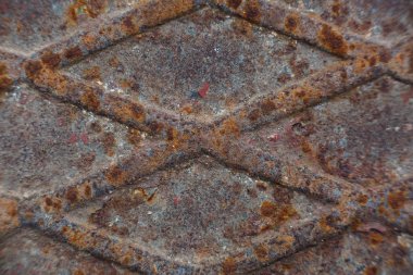 Rhombus şekillerle, closeup paslı metal doku