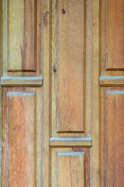 Closeup Porta de madeira com textura pronunciada — Fotografia de Stock