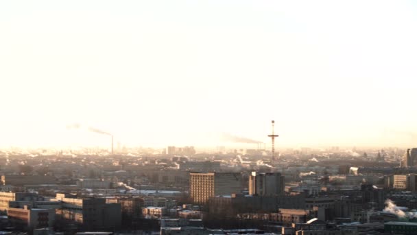 Morning in urban city. St. Petersburg. From pipe goes smoke. construction site cranes are working. Russia — Stock Video