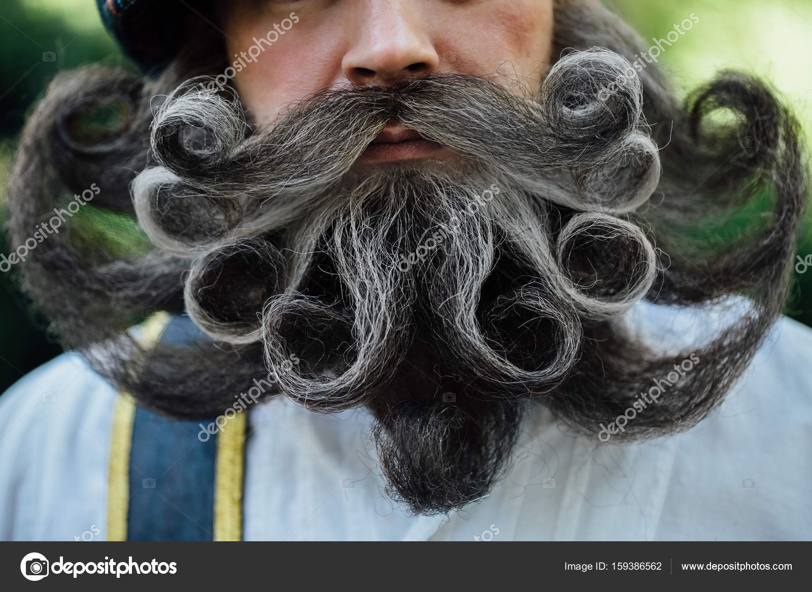 Handsome portrait of a brave Scot with a amazing beard and mustache curls  in the Hungarian style. Stock Photo by ©photominus 159386562